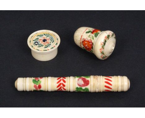 A painted bone needle case, a thimble case and a circular box, all brightly painted with flowers 9.5cm, 4.5cm and 9.5cm  (3)