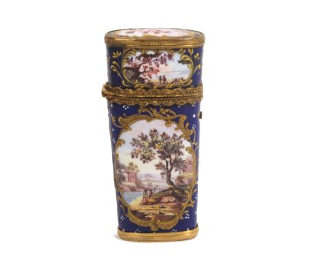 A late 18th Century/early 19th Century enamel etui of oval section and tapering form decorated with five landscape panels wit