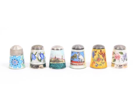 Six silver and enamel thimbles by James Swann and Sons, all hall marked, four in floral enamel, one advert and 'Houses of Par