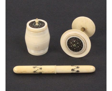 Three 19th Century ivory sewing tools comprising a cylinder needle case with burnt circle decoration, 7.5cm, a cotton barrel 