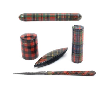 Tartan ware - five pieces comprising a shuttle, 7.2cm, a cylinder needle case (Prince Charlie) damage to joint, 9cm, a stilet