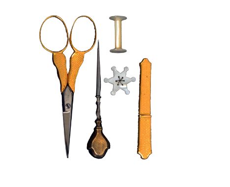 A set of gold tools for an etui, circa 1900, comprising a pair of steel blade scissors with gold engine turned arms and plain