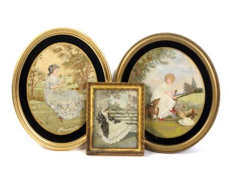 Three Edwardian silk and facially painted needle works in the Georgian style comprising an oval of a girl with spade, wheelba
