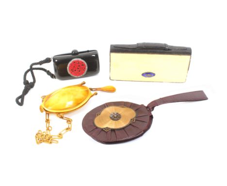 Four vintage compacts and purses comprising a black plastic example in the Chinese style, cord suspension, 10cm, another as a