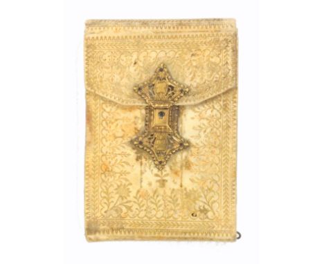 A fine gilt tooled vellum hussif, circa 1790, decorated with flowers and other motifs, elaborate pierced and engraved catch, 