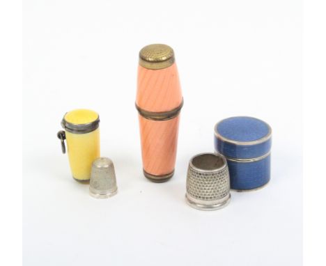 Three enamel thimble cases comprising a pink enamel thimble compendium, 5.2cm, a blue enamel and silver gilt thimble case of 