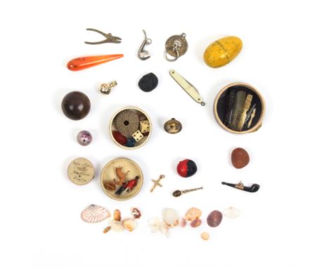 A collection of miniature items including two pipes, 2.2cm, pliers, miniature enamel mask door knocker, gold orb, coronation 