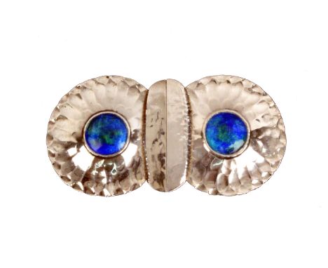 A silver and enamel two part buckle for Liberty and Co., each part as a planished flower head with central enamel boss, Birmi