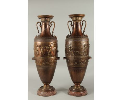 A SUPERB LARGE PAIR OF CLASSICAL BRONZE VASES with Egyptian sconces, on circular marble bases. 60cms high.