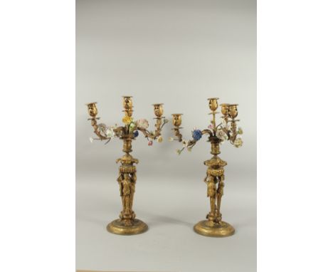 19TH CENTURY FRENCH, CIRCA 1840. A SUPERB PAIR OF FOUR LIGHT CANDELABRA with encrusted porcelain flowers on a stem and three 