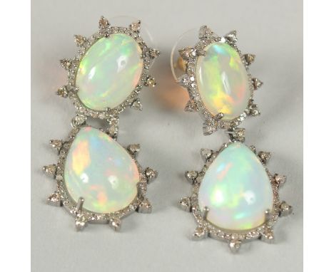 A PAIR OF VINTAGE STYLE DOUBLE DROP EARRINGS IN WHITE METAL and 14k stamped posts, set with cabouchon pear shape and oval opa