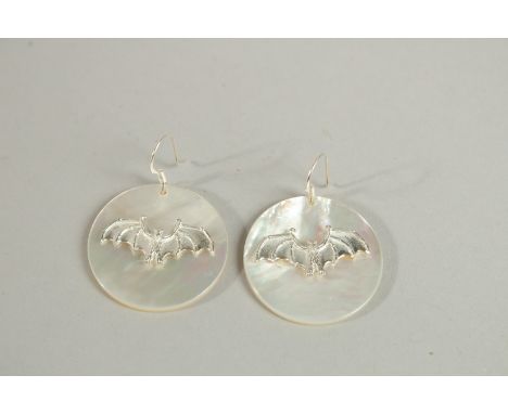 A PAIR OF SILVER AND MOTHER OF PEARL BAT EARRINGS.
