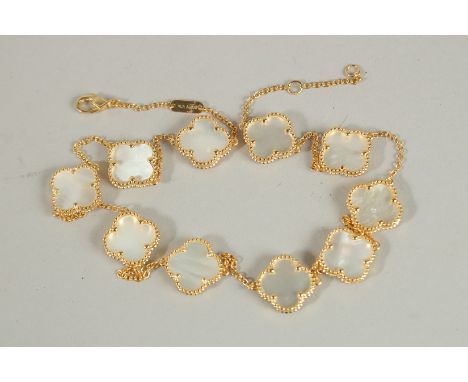 A SILVER GILT AND MOTHER OF PEARL NECKLACE.