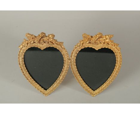 A  DOUBLE GILT BRONZE EASEL PHOTOGRAPH FRAME. 18cms.