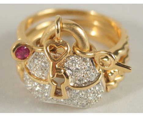 AN 18CT GOLD, DIAMOND AND RUBY RING.