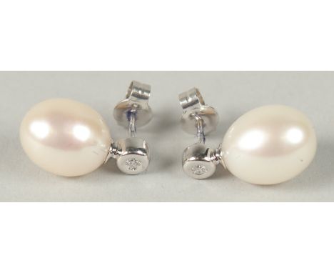 A PAIR OF 18CT WHITE GOLD, DIAMOND AND PEARL STUD EARRINGS