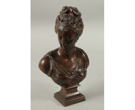 A GOOD 19TH CENTURY BRONZE HEAD AND SHOULDERS OF A YOUNG LADY "DIANA". 27cms high.