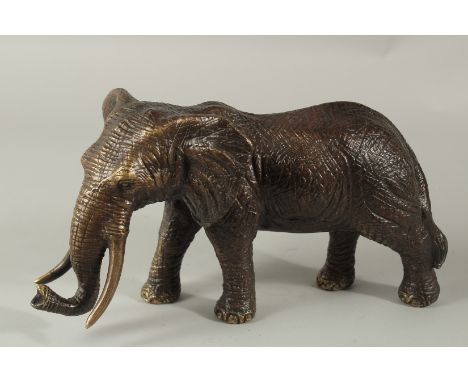 A GOOD BRONZE ELEPHANT. 28cms long.