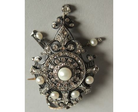 A VICTORIAN SILVER AND 15CT GOLD PEARL INSET BROOCH/PENDANT.
