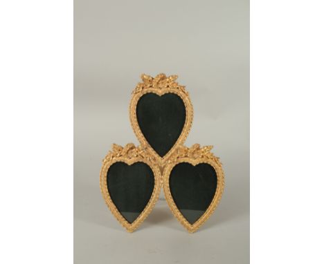 A TRIPLE GILT BRONZE EASEL PHOTOGRAPH FRAME. 32cms.