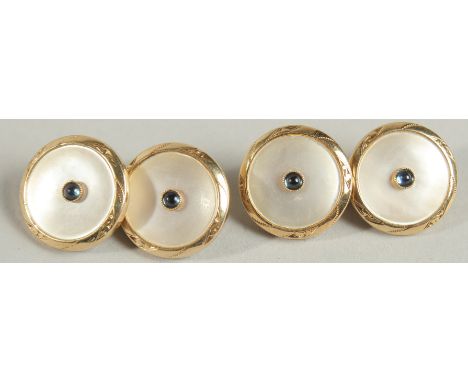 A PAIR OF ENGRAVED 18CT GOLD SAPPHIRE AND MOTHER OF PEARL CUFF LINKS.
