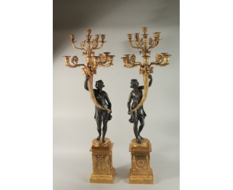A SUPERB LARGE PAIR OF THOMAS HOPE DESIGN BRONZE AND ORMULU CANDELABRA two ttiers of four branches with a classical figure ho