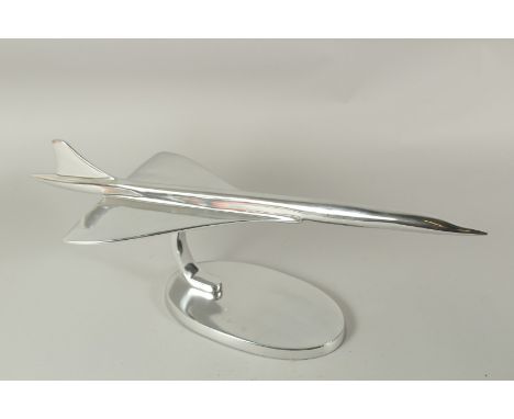 A LARGE CHROME MODEL OF CONCORD on an oval base. 55cms long