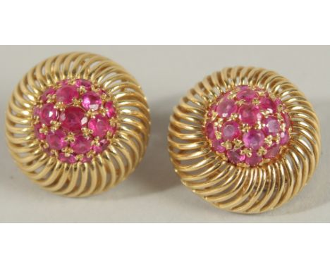 A PAIR OF 18CT GOLD AND RUBY EARRINGS.