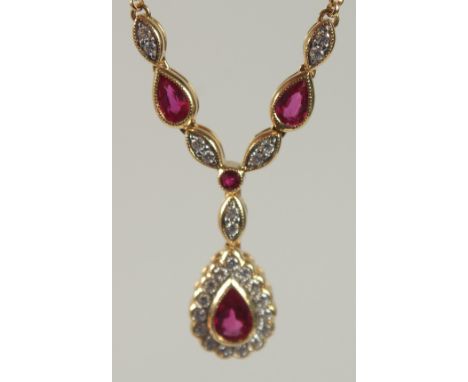 AN 18CT YELLOW GOLD,  RUBY AND DIAMOND DEMI NECKLACE.