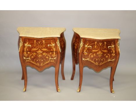 A PAIR OF LOUIS XVITH STYLE BOMBE FRONTED TWO DRAWER COMMODE with gilt metal mounts on curving feet. 61cm wide, 74cm high.