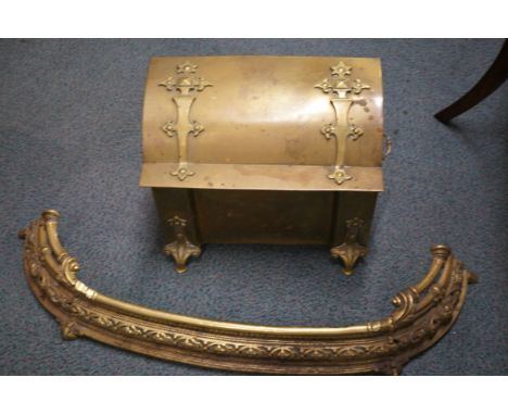 Brass fire side log bin together with a heavy brass fender