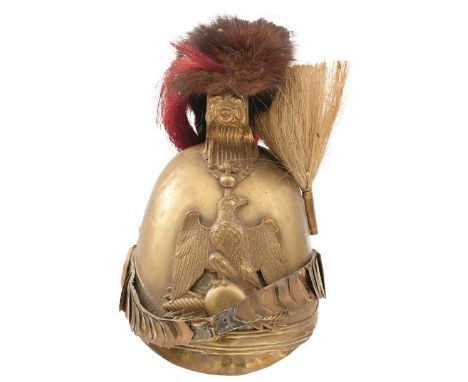 A 19TH CENTURY FRENCH TROOPER'S HELMET, the brass skull applied with an eagle helmet plate, fur and horse hair plume, leather