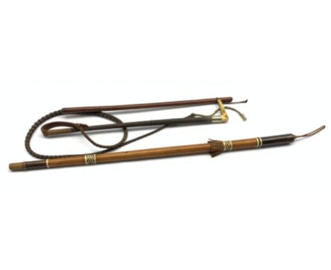 Early 20th century plaited leather riding crop with antler handle and plated collar, a leather bound swagger stick and an Afr