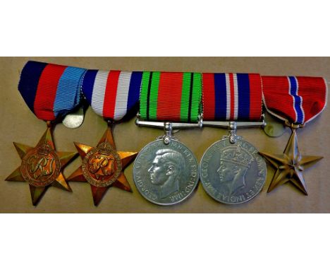 British WWII Bronze Star Group of five: 1939 - 1945 star, France and Germany star, Defence Medal and War Medal. Named to Lt 9