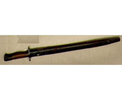 British 1907 Pattern Lee Enfield Bayonet made by Wilkinson with many military markings. Some wear to the scabbard.