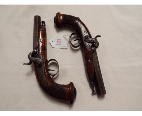 A pair of French percussion travelling pistols with octagonal engine turned style barrels, floral engraved lock plates and tr