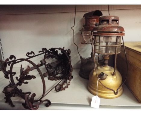 Two vintage Tilley lamps together with an old metal lantern