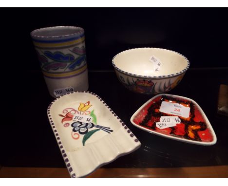 A Carter Stabler & Adams Poole pottery beaker, a Poole Delphis pin dish plus other Poole items 
