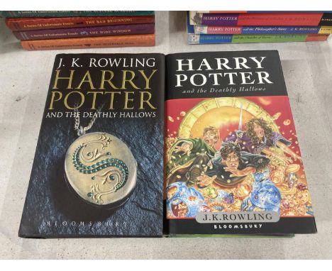 TWO FIRST EDITION HARDBACKS HARRY POTTER AND THE DEATHLY HALLOWS BY J.K ROWLING WITH DUSTOCVERS BOTH IN GOOD CONDITION 