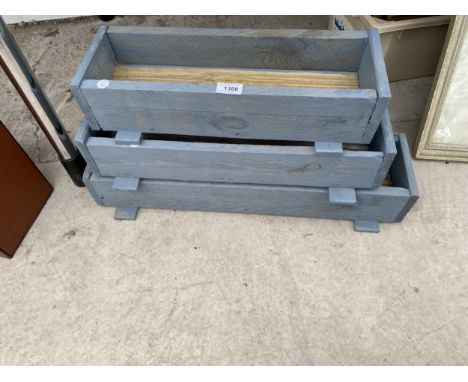 THREE GRADUATED WOODEN TROUGH PLANTERS 