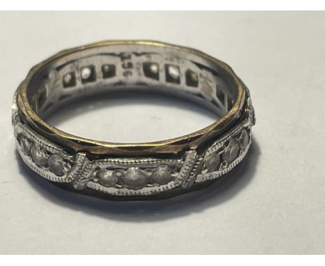 A 9 CARAT GOLD ETERNITY RING WITH CLEAR STONES SIZE L/M GROSS WEIGHT 2.96 GRAMS 