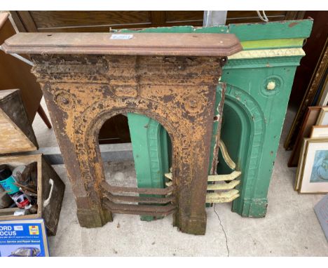 TWO VINTAGE DECORATIVE CAST IRON FIRE PLACES 