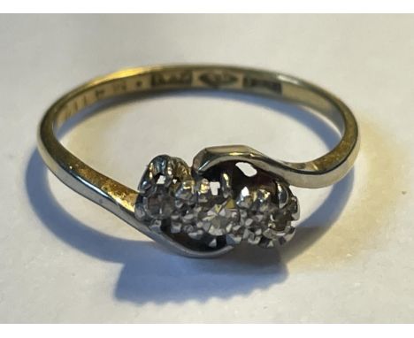 A PLATINUM RING WITH THREE IN LINE DIAMONDS SIZE L/M GROSS WEIGHT 2.01 GRAMS 