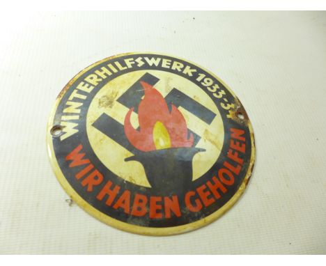 A GERMAN WINTERHILFSWERK ENAMEL SIG, 15CM DIAMETER 