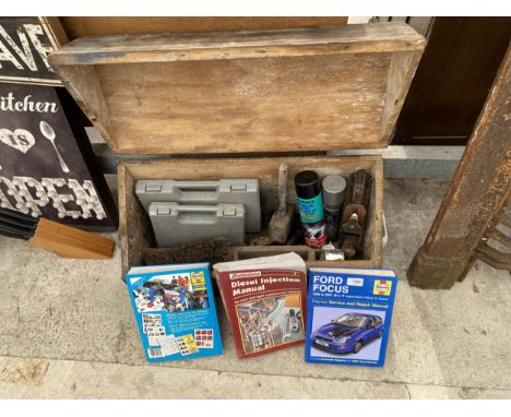 A VINTAGE WOODEN JOINERS CHEST WITH AN ASSORTMENT OF TOOLS TO INCLUDE A WOOD PLANE, MALLET AND MANUALS ETC 