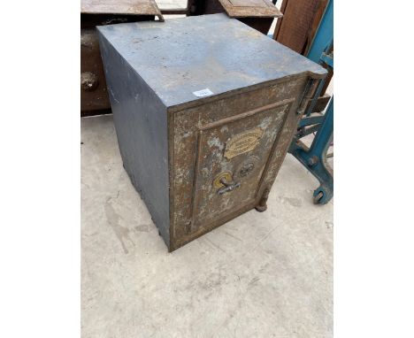 A VINTAGE SAFE WITH BRASS PLAQUE BEARING THE NAME 'JACOB CARTWRIGHT' (NO KEY) 
