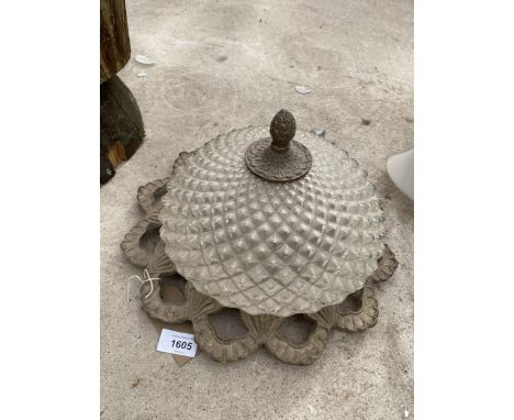 A DECORATIVE CEILING LIGHT FITTING 