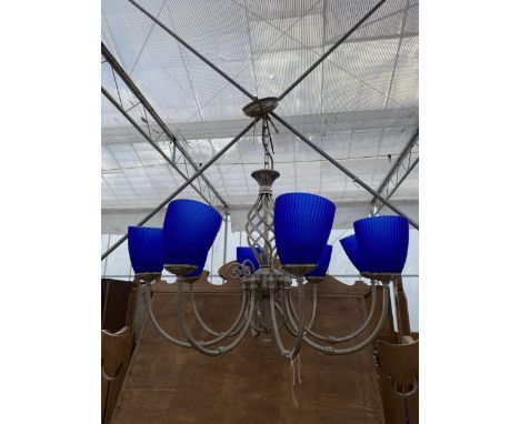AN EIGHT BRANCH CEILING LIGHT FITTING WITH BLUE GLASS SHADES 