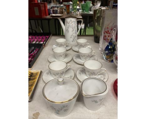 A GERMAN CHINA COFFEE SET TO INCLUDE A COFFEE POT, CREAM JUG, SUGAR BOWL, CUPS AND SAUCERS 