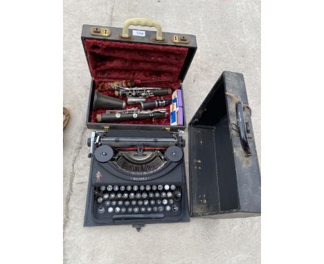 A VINTAGE CASED CLARINET AND AN OLIVER TYPEWRITER 